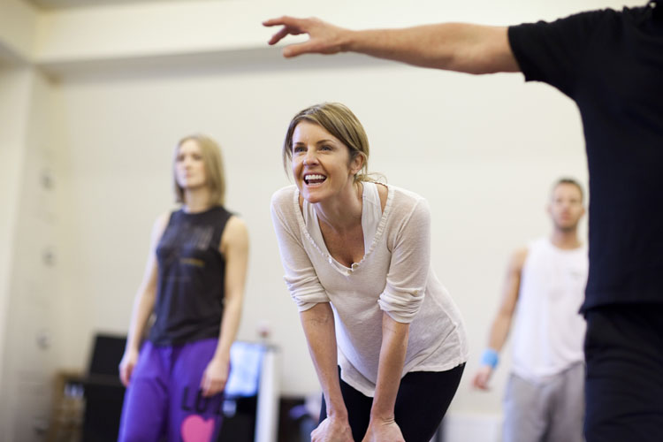 Erin Boag smiling while doing choreography for 'Anton & Erin Let's Do It'