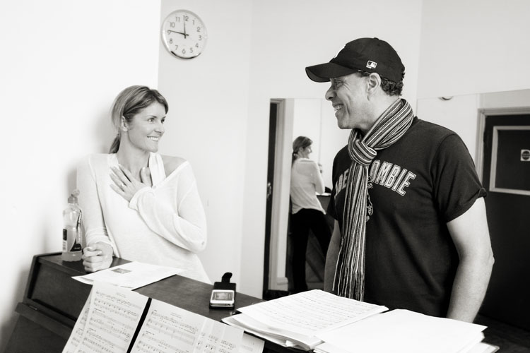 Erin Boag smiles while visiting with singer Lance Ellington