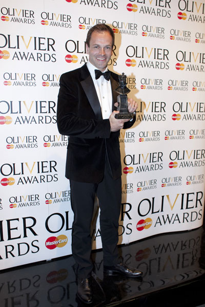 Olivier award winner Johnny Lee Millar with his statuette