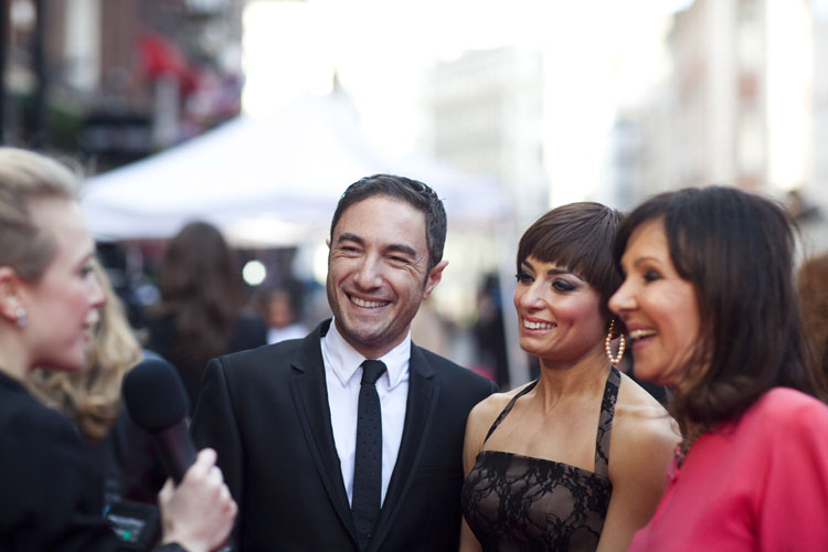 Vincent Simone, Flavia Cacace and Arlene Phillips being interviewed on the red carpet