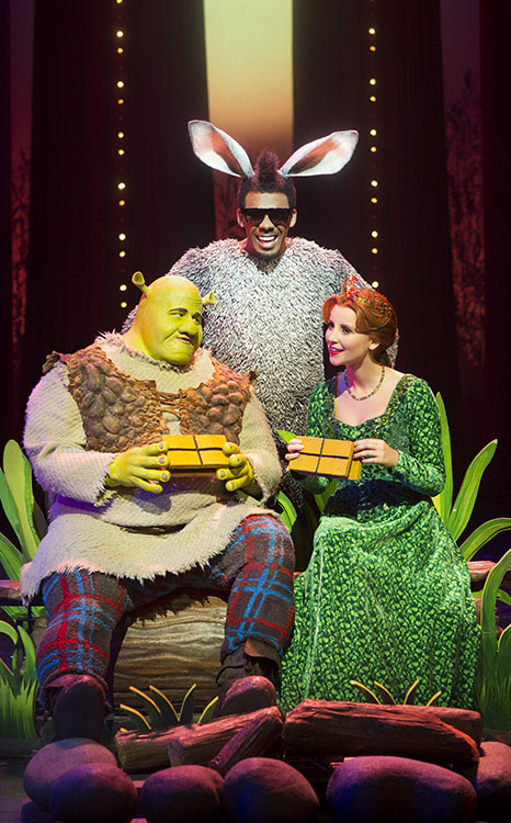 Dean Chisnall (Shrek), Richard Blackwood (Donkey) and Carley Stenson (Princess Fiona) from Shrek the Musical.