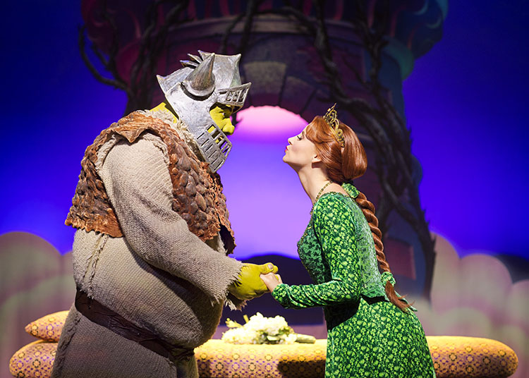 Princess Fiona (Carley Stenson) blows a kiss to Shrek (Dean Chisnall).