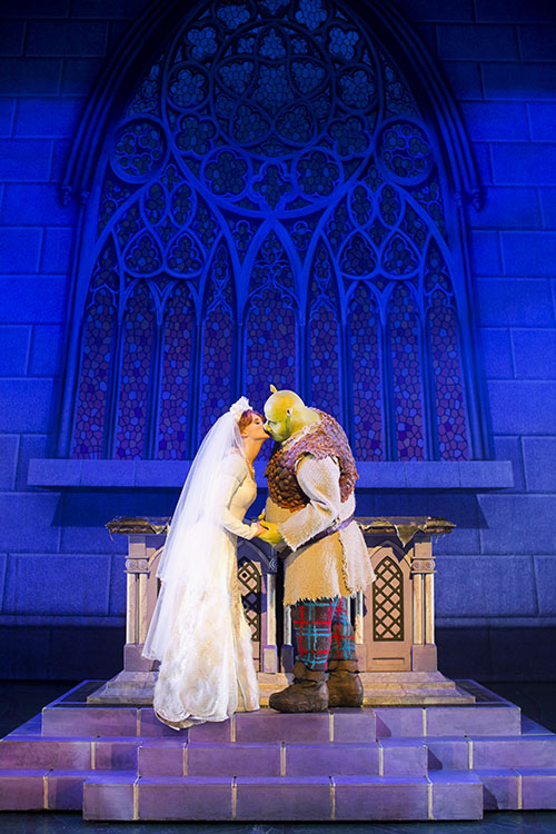 Princess Fiona (Carley Stenson) and Shrek (Dean Chisnall) share "love's true kiss".