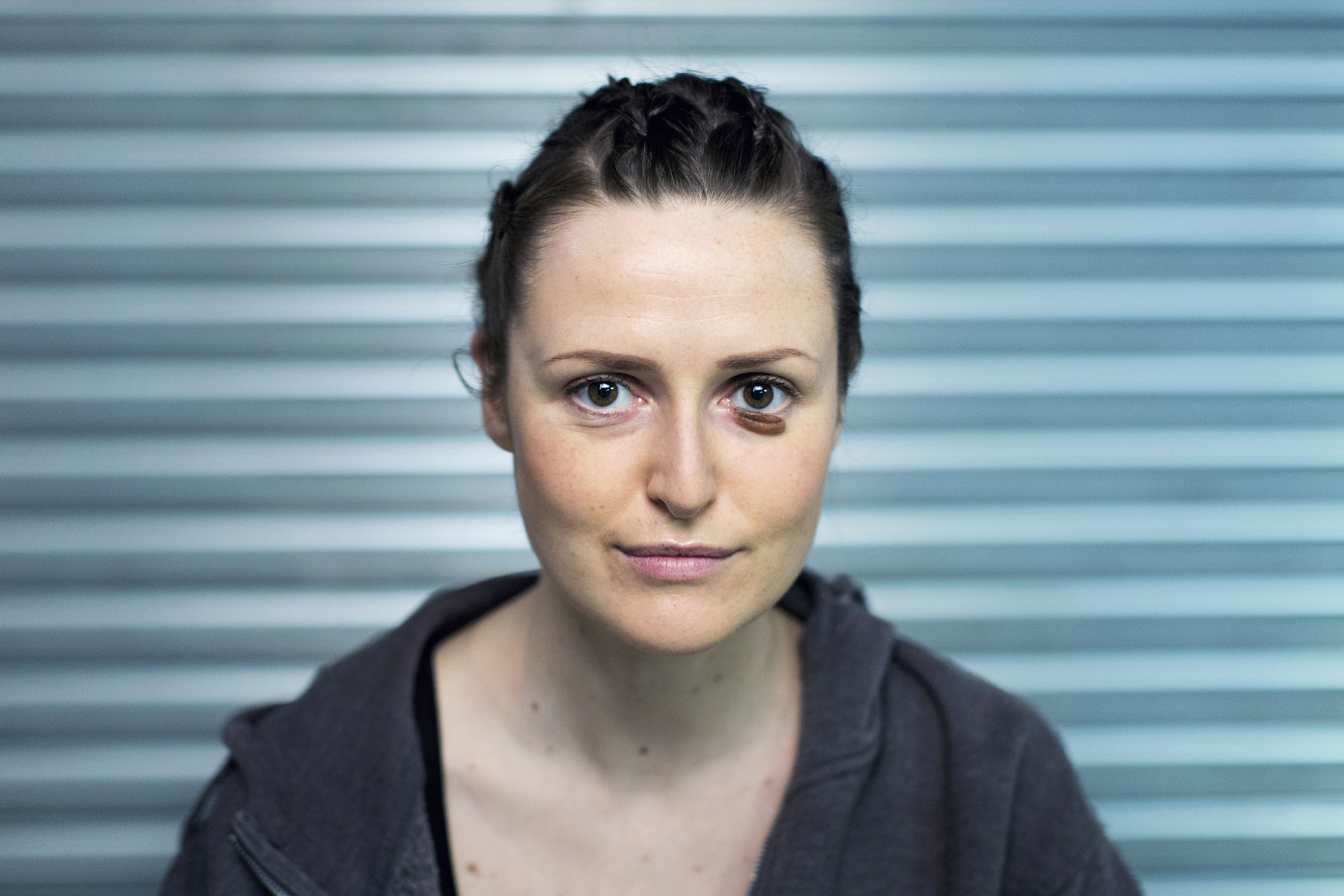 A portrait of Clare Dunne playing her prison character in the Donmar Trilogy