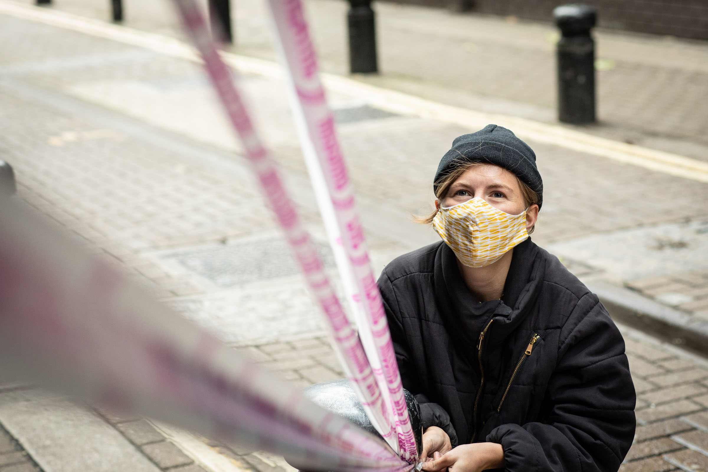 Designer Rosanna Vize outside the Phoenix Theatre with her facemask on