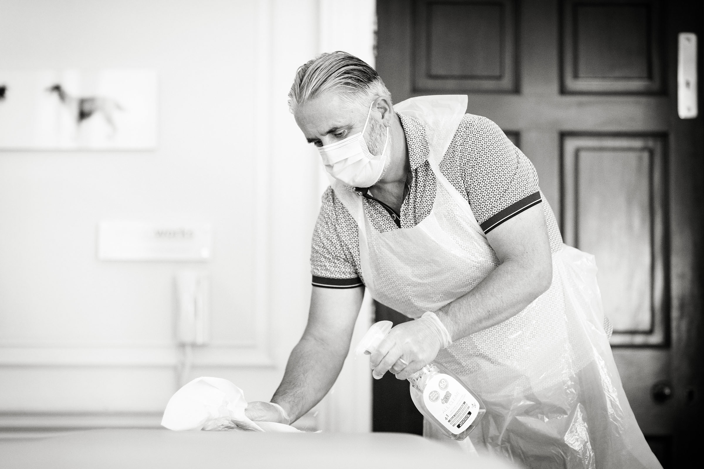 Warrick McNeill cleaning his London clinic to guard against Coronavirus.