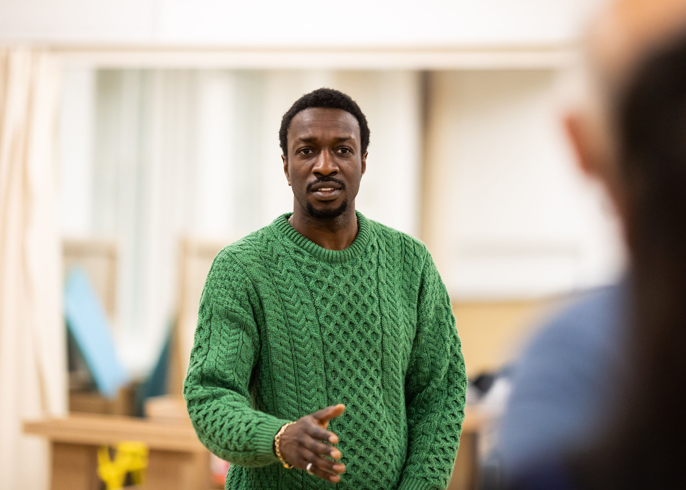Zephryn Taitte rehearsing his role as Charles Arthur Brown in the play Bitter Wheat